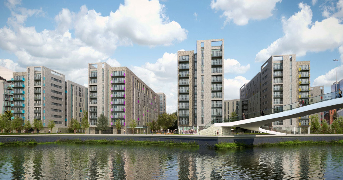 Clippers Quay in Salford: brick apartment blocks beside a canal.